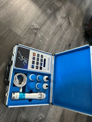 Masajeador terapéutico de cuerpo completo Shockwave, vibrador, relajante muscular Foto 1 de 4