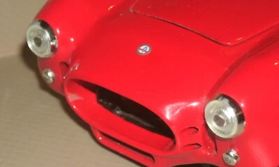 1/18 Scale 1965 - 1966 Shelby Cobra Headlight & Bezel Set (2) Ertl Model Parts - Image 1 of 4