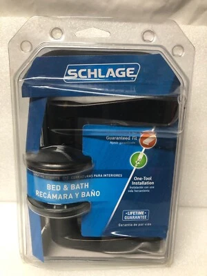 Manija de puerta con botón pulsador para cama y baño Schlage bronce envejecido F40 V ACC 716. NUEVO. Foto 1 de 4