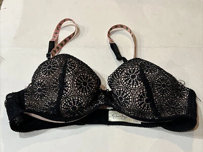 Sujetador con aros Jessica Simpson talla 36B diseño rueda negro Foto 1 de 4