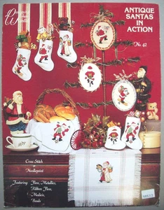 Christmas Santas Claus in action skiing dancing biking  cross stitch pattern - Picture 1 of 3