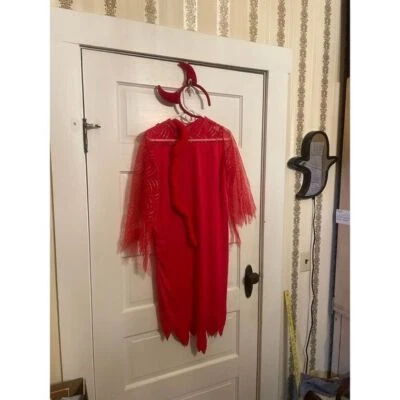 Disfraz de diablo para niña con brazos brillantes dorados y cola y cuernos Foto 1 de 2