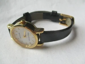 Reloj de pulsera analógico Sonata Velammal tono dorado hebilla negra resistente al agua 30 m - Imagen 1 de 12
