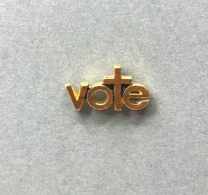 Vote With A Cross Shaped "T" Gold Tone Metal Lapel Pin - Imagen 1 de 3
