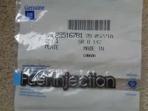 1984-1990 OLDS BUICK "FUEL INJECTION" FRT FENDER EMBLEM - NEW OEM GM 25516781 - Picture 1 of 4