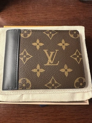 Cartera plegable de cuero para hombre Louis Vuitton LV Foto 1 de 4