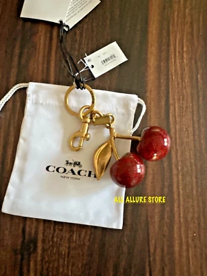 COACH Llavero o Bolso Dorado Rojo Cereza Dije 77840 Auténtico NUEVO CON ETIQUETAS CON BOLSA Foto 1 de 4