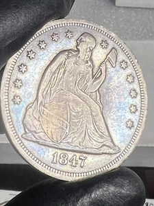 1847 seated liberty silver dollar looks possible XF, gorgeous toning - Picture 1 of 9