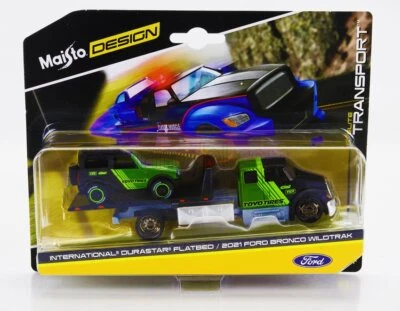 MODELLINO CAMION STATICO MAISTO INTERNATIONAL DURASTAR RAMP FORD BRONCO 1/64 - Immagine 1 di 4