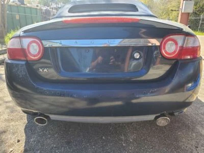 Jaguar XK 2007 2008 2009 OEM cuarto trasero derecho montado luz trasera grietas lente Foto 1 de 4