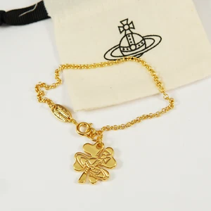 Vivienne Westwood Bracelet Gold Tone Lucky Four Leaf Clover London Orb - Picture 1 of 7