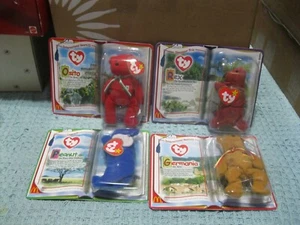 4 Ty beanie babies - 1 leggenda, 2 internazionali II, 1 trio di dinosauri - Foto 1 di 3