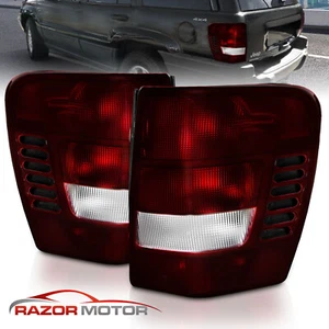 Par de luces traseras rojas oscuras para Jeep Grand Cherokee 1999-2004 - Imagen 1 de 7