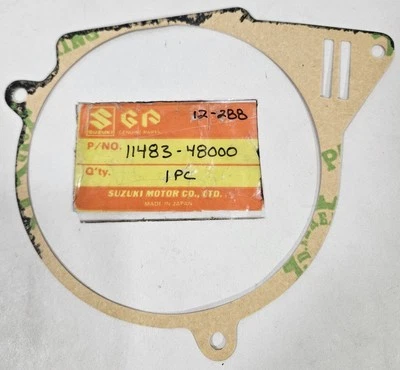 1 NOS Genuine 1978-1981 Suzuki TS 100 125 Magneto Stator Gasket OEM 11483-48000 - Image 1 of 2