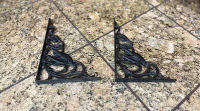 Pre Owned Vintage/Antique Black Pair Of Cast Iron Floral Wall Shelf Brackets - Image 1 of 4