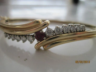 14K YELLOW GOLD RUBY AND DIAMOND BANGLE BRACELET - Image 1 of 4