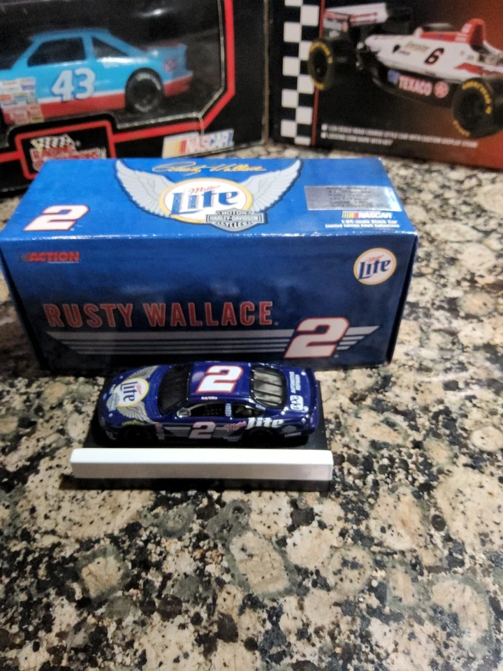 1999 Action #2 Rusty Wallace Harley Davidson Miller Lite Taurus 1/64 NASCAR - Image 1 of 4