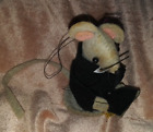 felt mouse Christmas ornament wears glasses and reading a book