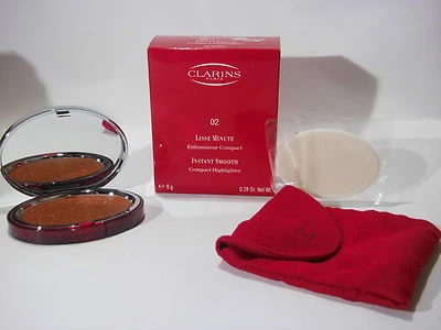 Clarins Lisse Minute Instant Smooth Compact Highlighter 02 Bronze 8g - Bild 1 von 3