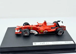 Modellino auto scala 1:43 FORMULA 1 f1 Ferrari 248 Schumacher 2006 Hot Wheels - Imagen 1 de 4