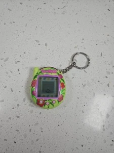 Tamagotchi Connection V3 2004 Green Pink Tropical Hibiscus Flowers Tested Works - Picture 1 of 7