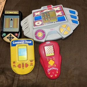 4 deal Or No Deal ,Hollywood Squares ,Connect Four, checkers hand held games - Picture 1 of 5
