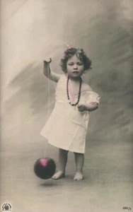 ANTIQUE Real Photo SWEETEST Young Girl with Pink Ball on String POSTCARD UNUSED - Imagen 1 de 2