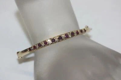 Fine 14K Yellow gold Hinged Diamond/ Ruby Oval Bangle Bracelet 14.1 Grams - Image 1 of 4