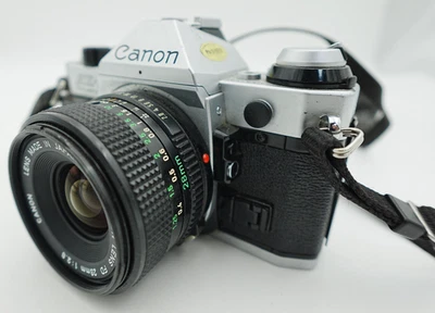 Cámara fotográfica Canon AE-1 35 mm SLR con lente FD 28 mm - PROBADA Foto 1 de 4