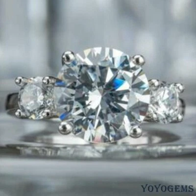 Anillo de compromiso moissanita de tres piedras corte redondo de 3 quilates VVS1 oro blanco sólido de 14 quilates Foto 1 de 4
