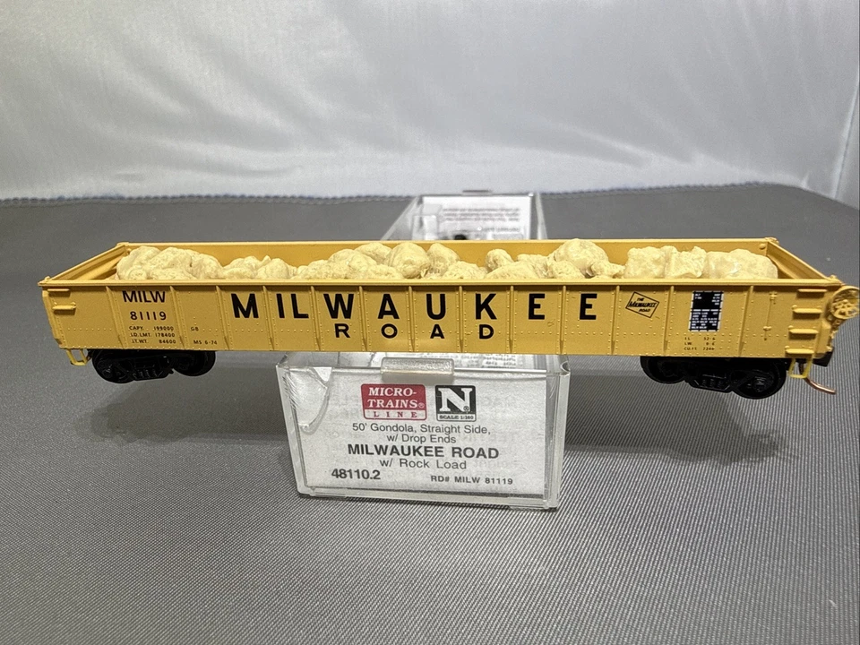 N Scale Micro-Trains MTL 48110.2 MILW Milwaukee Road 50' Gondola #81119 w/ Load - Image 1 of 4