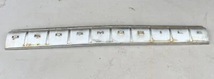 1964 Oldsmobile 442 F85 Rear Trim Plate, Name Plate, 4408423, GM Original, Olds - Picture 1 of 4