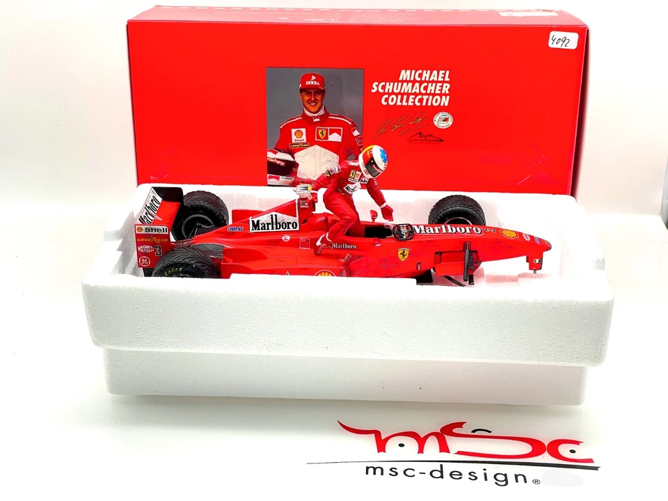 1:18 Schumacher Ferrari F300 GP Belgien Umbau, Raintyres, mit Zertifikat - Bild 1 von 4
