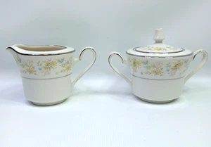 Crema y azucarero Noritake Blossom Time Ivory China flores pastel con tapa 7150 - Imagen 1 de 6