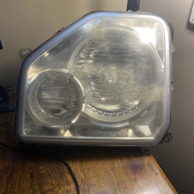 Conjunto de faros laterales del conductor izquierdo Jeep Liberty 08-12 fabricante de equipos originales de fábrica Foto 1 de 2