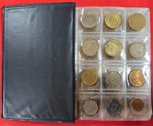 A collection of different types of coins in a folder 120 pieces - Picture 1 of 11