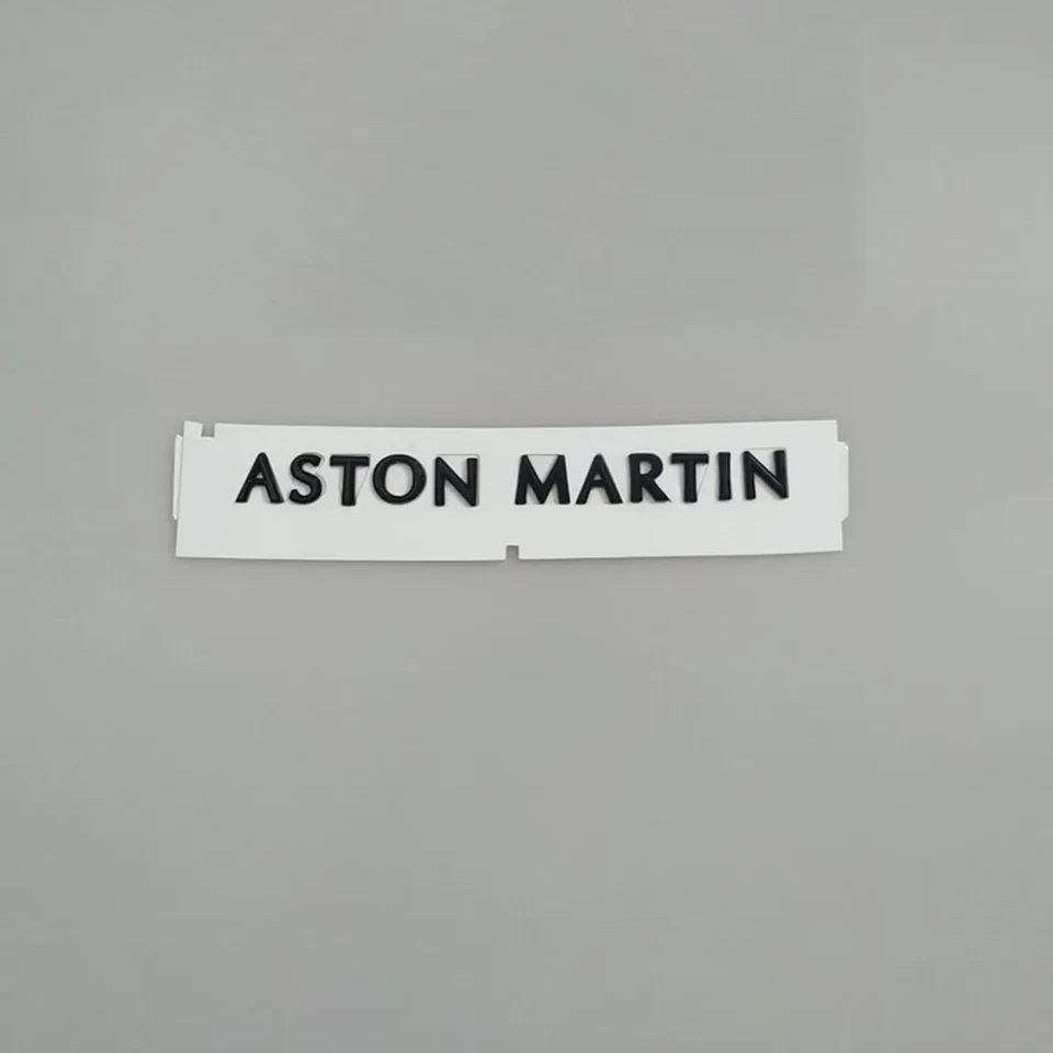 Aston Martin DB11 Vantage Script задняя эмблема глянцевая черная JY53-001B40-AA 1 шт. - Изображение 1 из 2