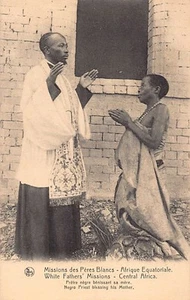 Uganda - A catholic priest blessing his own mother - Publ. White Fathers' Missio - Picture 1 of 2