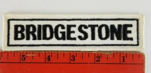 Parche publicitario de uniforme de neumáticos Bridgestone vintage - Imagen 1 de 2