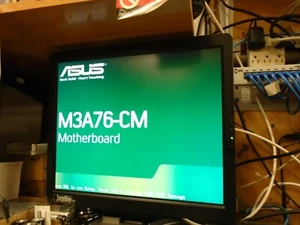 Asus M3A76-CM Rev 1.00g + AMD 2.2 GHz ( 3500+ ) - Picture 1 of 7