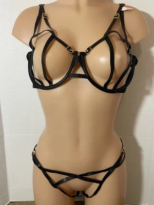 XL L VICTORIAS SECRET Conjunto de bragas sujetador con tiras de imitación de cuero sin forro pierna alta Foto 1 de 4