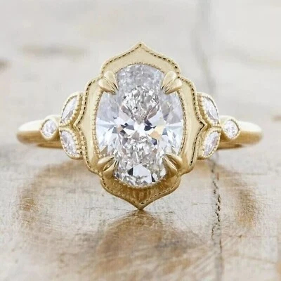 Anillo de compromiso para mujer de oro amarillo de 14 k con diamantes cultivados en laboratorio talla ovalada de 2,70 quilates Foto 1 de 4