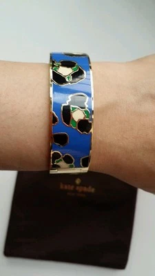 KATE SPADE ♤ BRAZALETE MODISMO "CAT'S OUT OF THE BAG" AZUL MULTICOLOR Foto 1 de 4