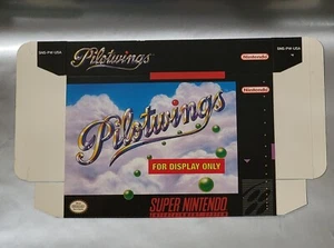 Nueva CAJA DE EXHIBICIÓN PILOTWINGS para Super Nintendo SNES Caja solamente (vacía sin juego) - Imagen 1 de 2