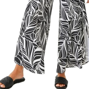 Pantalones de pierna ancha Lynsu con estampado de hojas negras + blancas Coolibar XS nuevos con etiquetas - Imagen 1 de 16