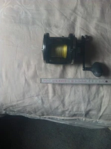 Angelrolle Abu Garcia Ambassadeur GT335 mit geflochtener Schnur - Bild 1 von 8