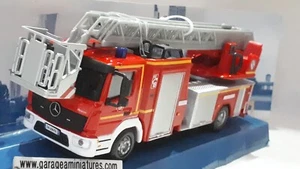 MERCEDES ATEGO MAGIRUS DLK 23/12 POMPIERS BURAGO REF 32018 ECHELLE AU 1/50 EME - Foto 1 di 6