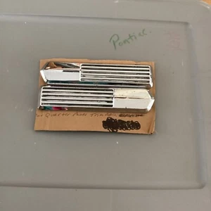 1959 Pontiac Bonneville Star Chief Rear Quarter Panel Trim Set WPins OEM 4760658 - Picture 1 of 4