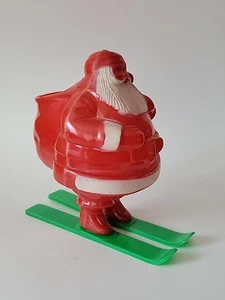 Vintage Santa Delivering Toys on Skis Candy Container Plastic - Picture 1 of 12