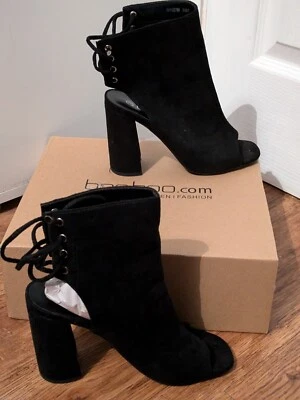 Botines con cordones traseros de tacón bloque Foto 1 de 4